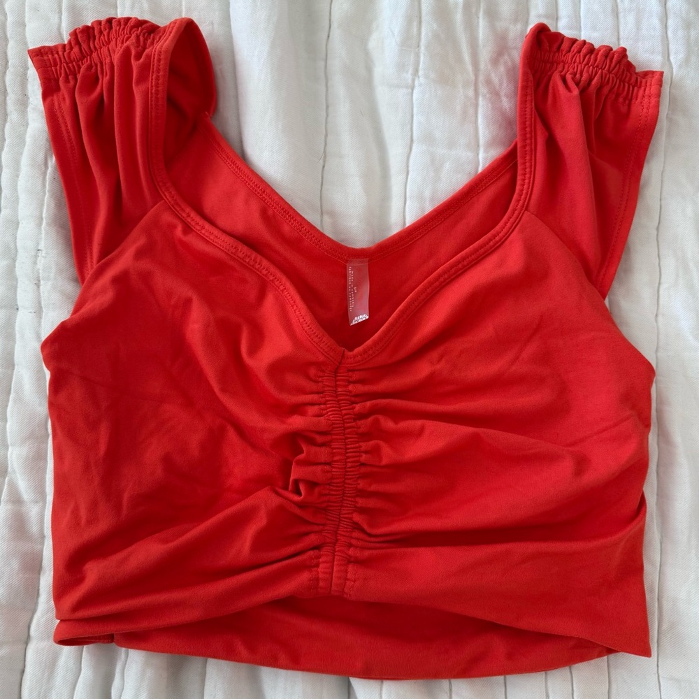 FP Movement by Free People bright orange breathe deeper Crop Top
